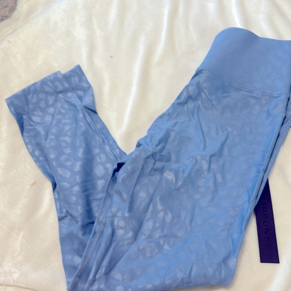 NWT - Carbon 38 blue leggings with cheetah print. Size M